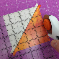 http://leahday.com/products/machine-quilting-block-party